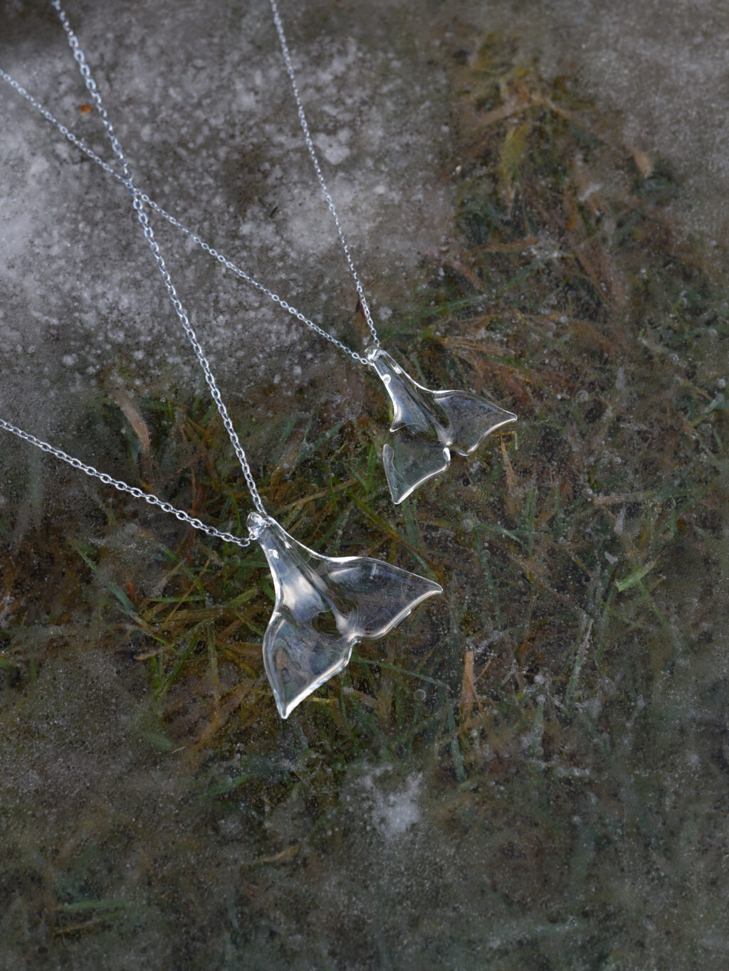 glass whale fluke necklace