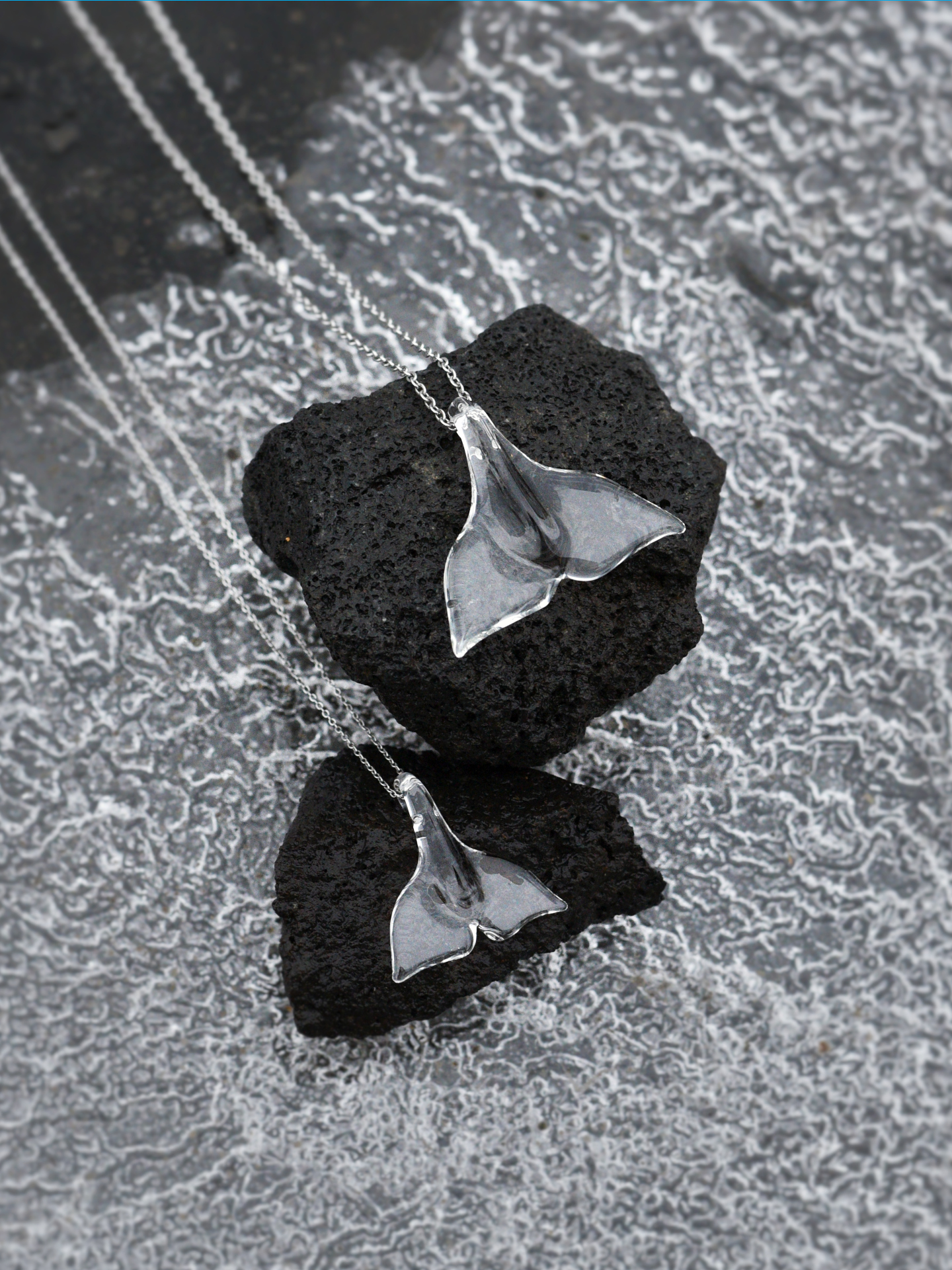 glass whale fluke necklace